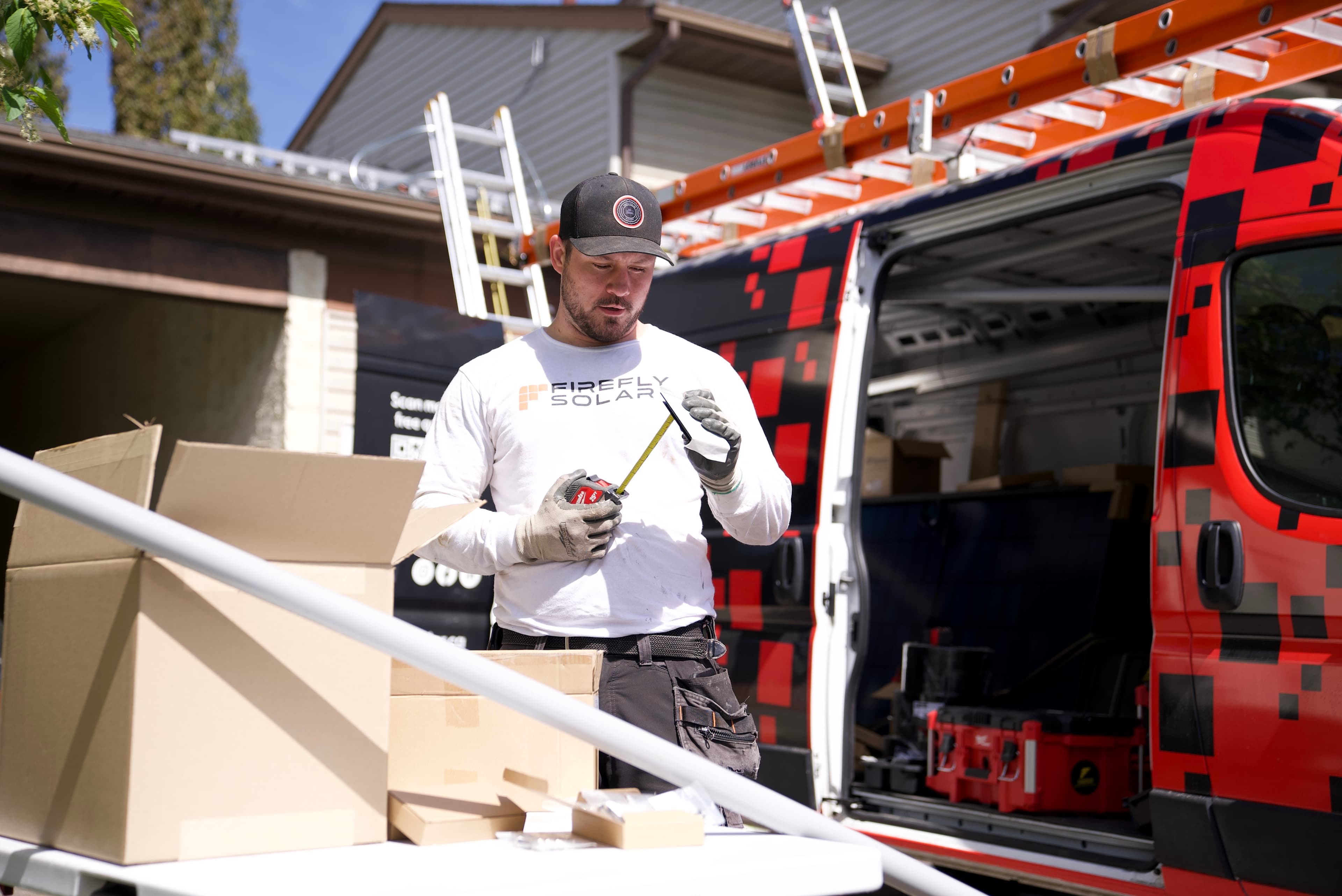 Firefly Solar crew installing panels on a roof